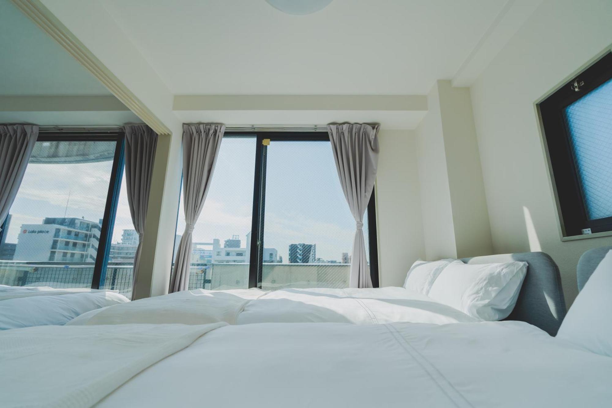 Blossom Coat Sakuragawa Lejlighedshotel Osaka Eksteriør billede