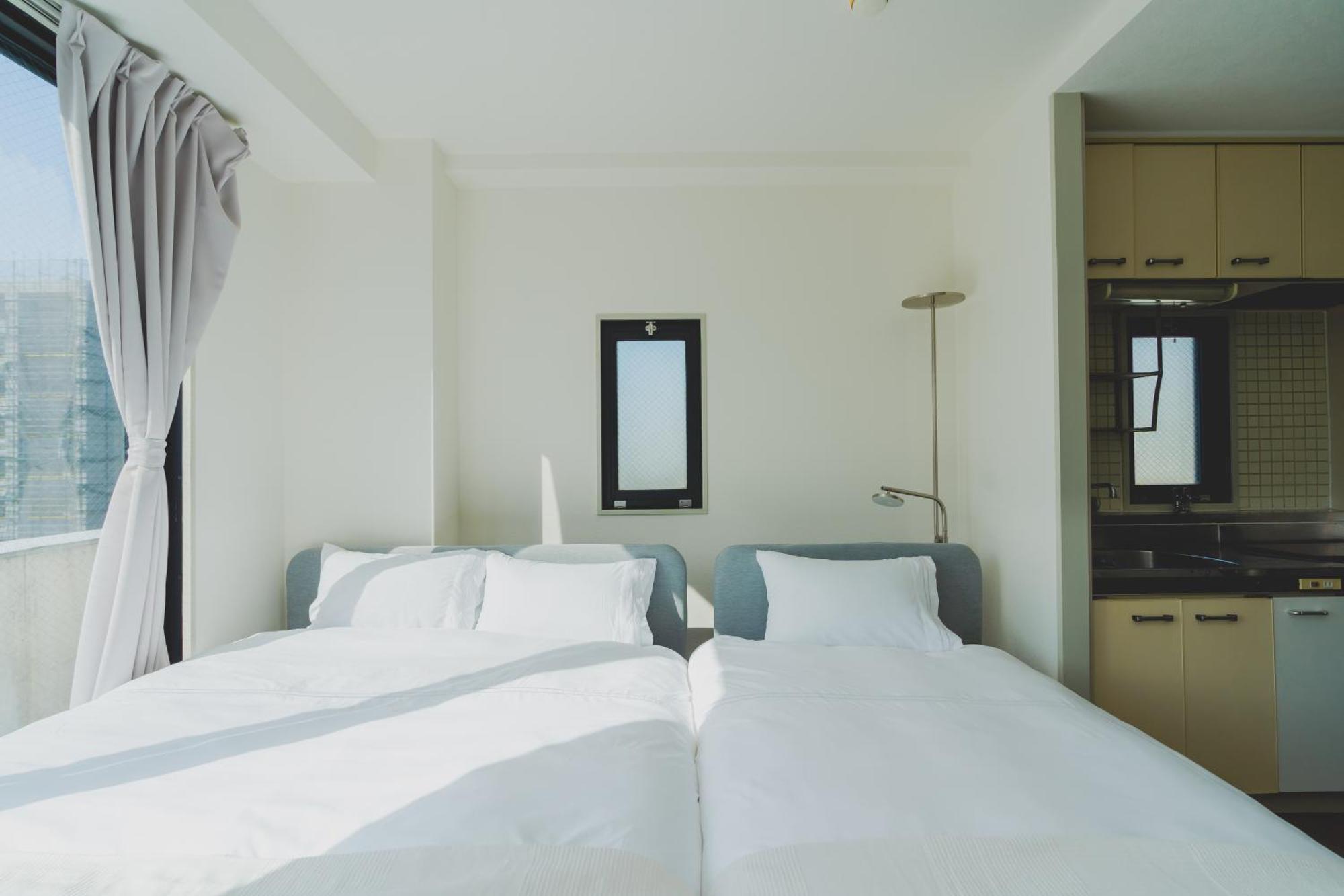Blossom Coat Sakuragawa Lejlighedshotel Osaka Eksteriør billede