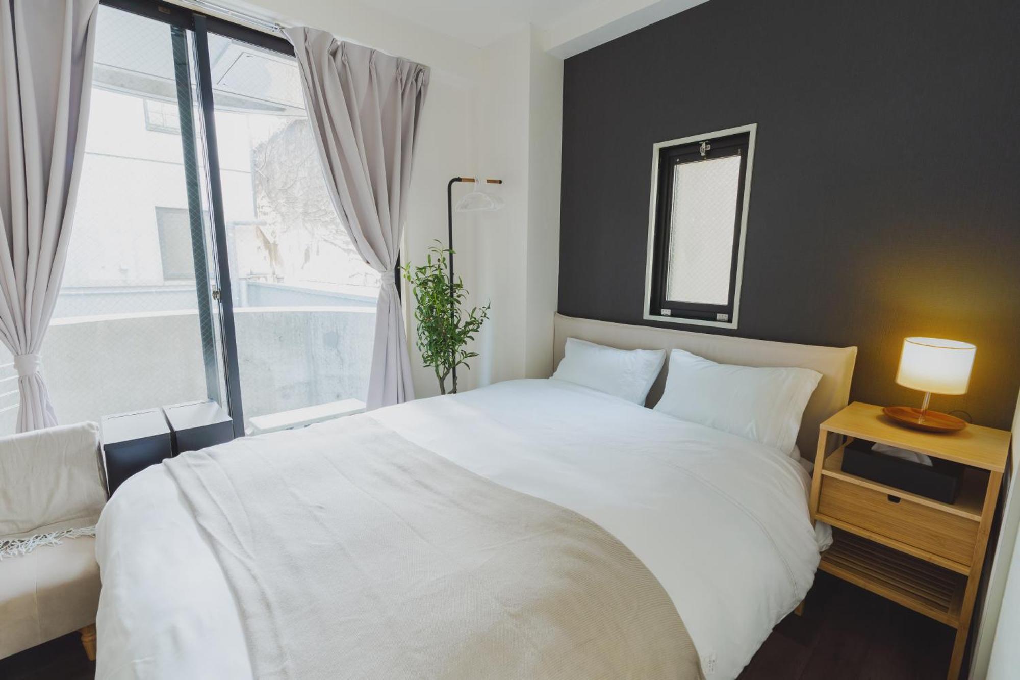 Blossom Coat Sakuragawa Lejlighedshotel Osaka Eksteriør billede